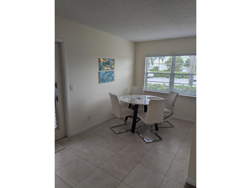 Bright ground-floor corner unit, partially furnished, featuring - photo 30