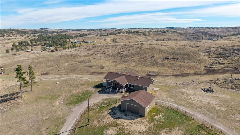 Custom built home sits on a little over 16 acres, it is located - photo 31