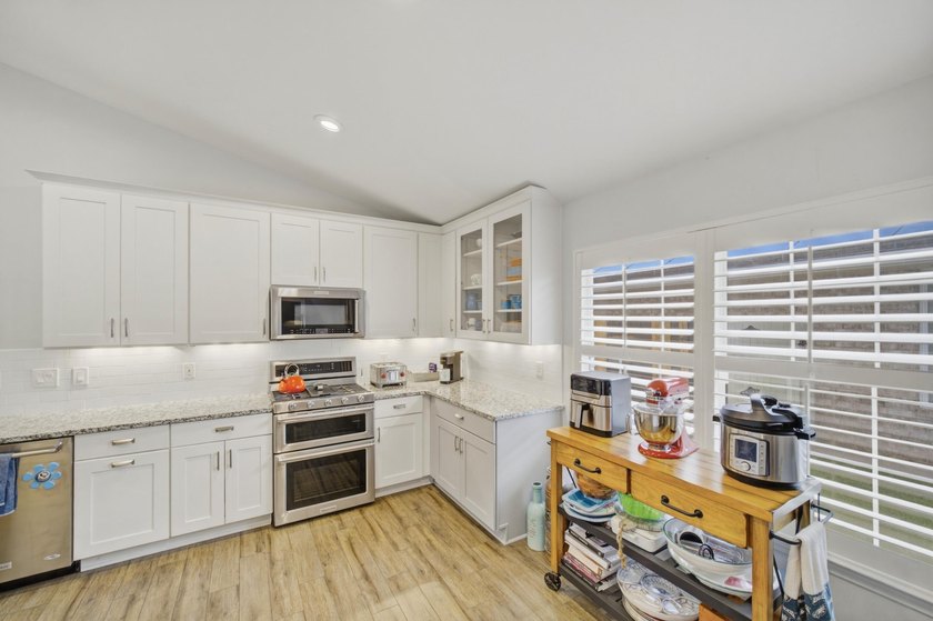 Welcome to this beautifully upgraded coastal retreat in the - photo 7