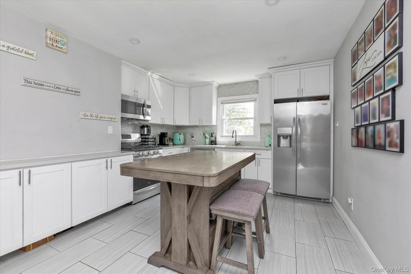Renovated in 2020, this home features a large kitchen, living - photo 6