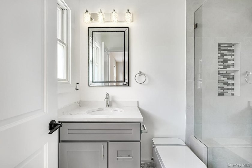 Stunning Newly Renovated Home in Hampton Bays! Welcome to this - photo 14