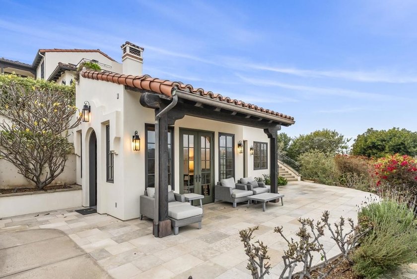 Welcome to 6152 Avenida del Duque, an extraordinary 7-bedroom, 7 - photo 8