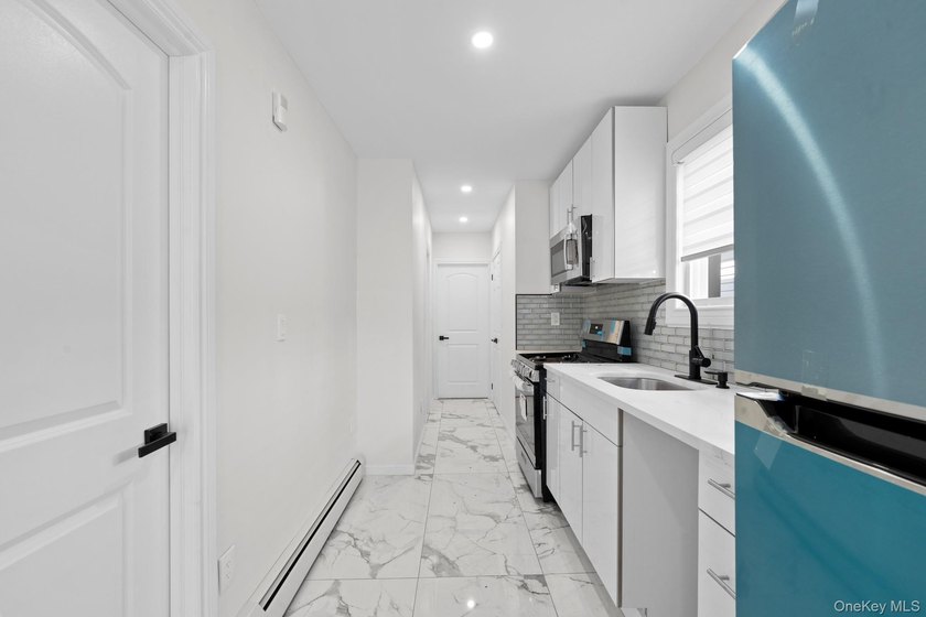 Opportunity Knocks! 148-01 133rd Avenue is a newly renovated - photo 11