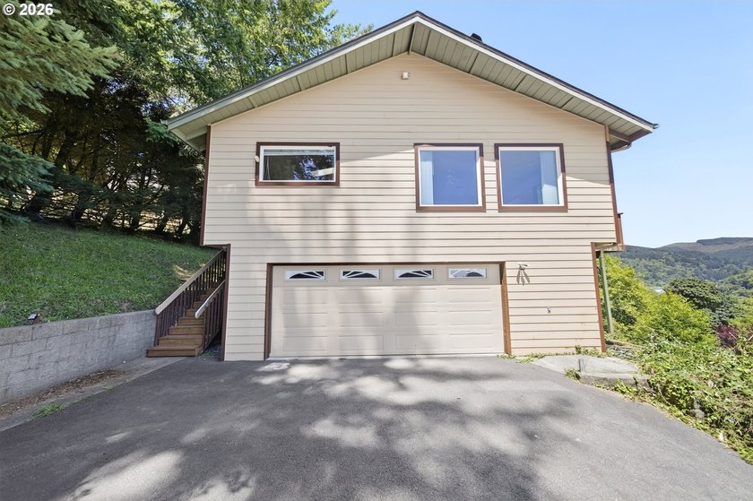 Nestled on over half an acre, this versatile 2-story home offers - photo 3