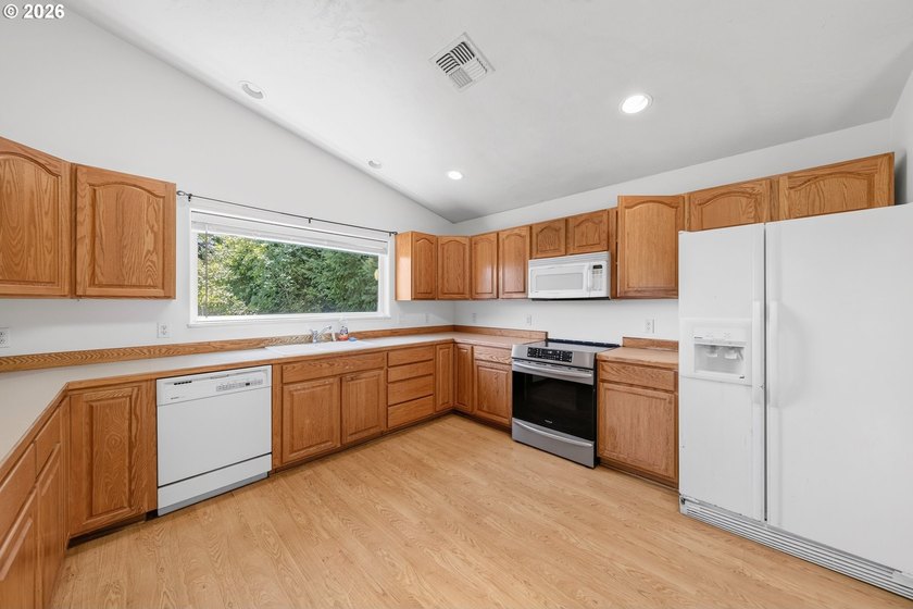 Nestled on over half an acre, this versatile 2-story home offers - photo 9
