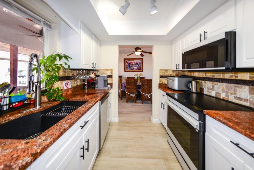 PRICE REDUCED! COMPLETELY REMODELED AND UPDATED 3/2/2 SAILBOAT - photo 12