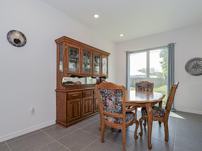 LIKE NEW beautiful 2022 built concrete block home located in the - photo 12