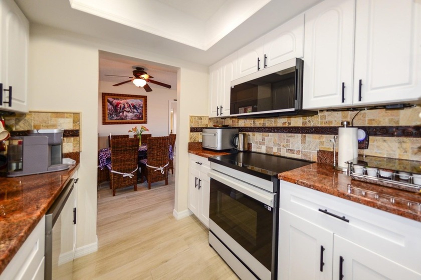 PRICE REDUCED! COMPLETELY REMODELED AND UPDATED 3/2/2 SAILBOAT - photo 14
