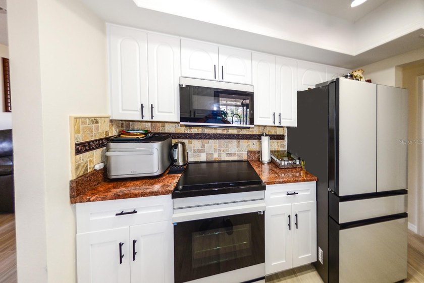 PRICE REDUCED! COMPLETELY REMODELED AND UPDATED 3/2/2 SAILBOAT - photo 17