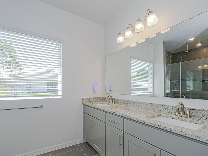 LIKE NEW beautiful 2022 built concrete block home located in the - photo 17