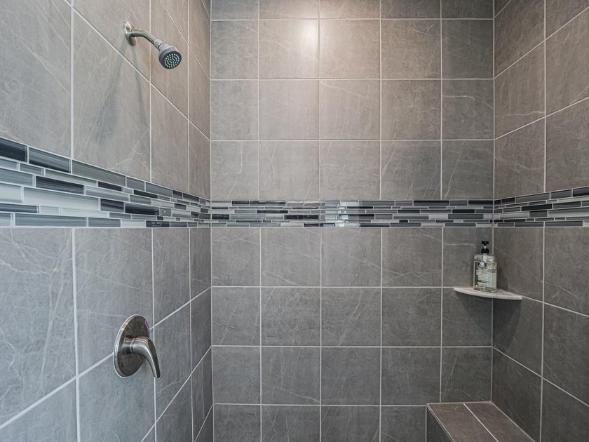 LIKE NEW beautiful 2022 built concrete block home located in the - photo 18