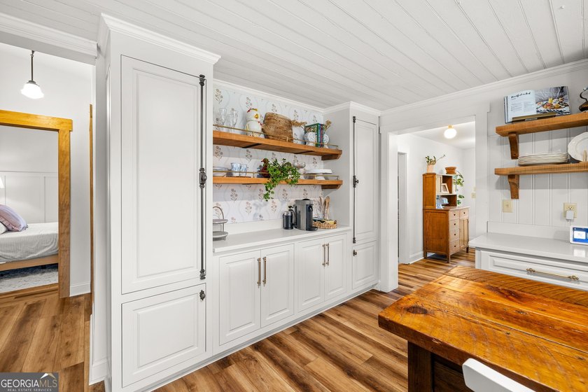 A beautifully remodeled farmhouse situated on 13.39 private - photo 9