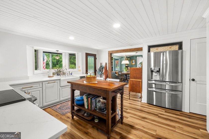 A beautifully remodeled farmhouse situated on 13.39 private - photo 10
