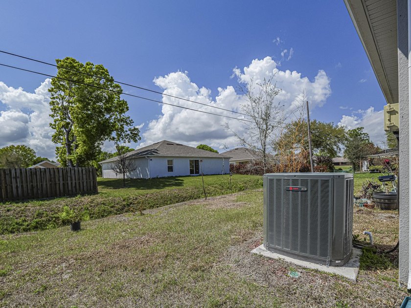 LIKE NEW beautiful 2022 built concrete block home located in the - photo 27
