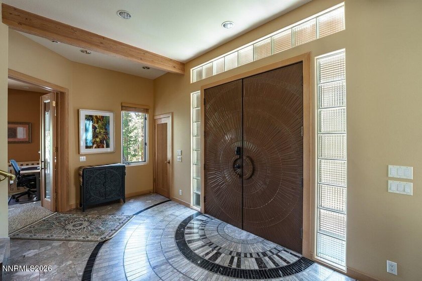 Nestled within the private, gated, waterfront community of - photo 8
