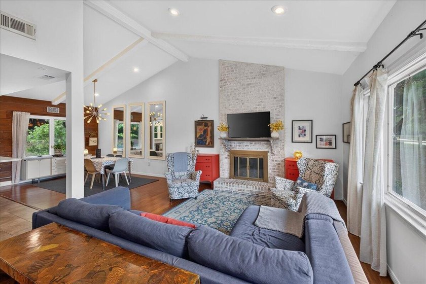 Nestled on a spacious double lot of just over half an acre, this - photo 8