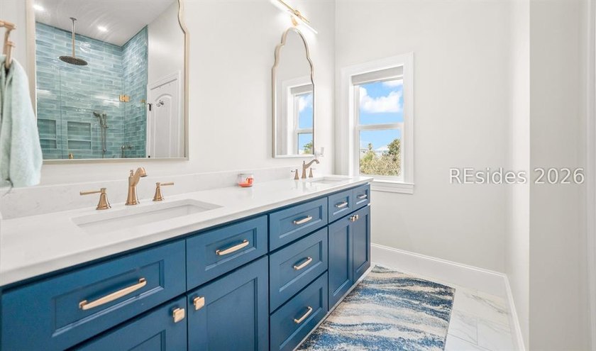 Welcome to 5 Tradewind Lane, a stunning coastal retreat in the - photo 49