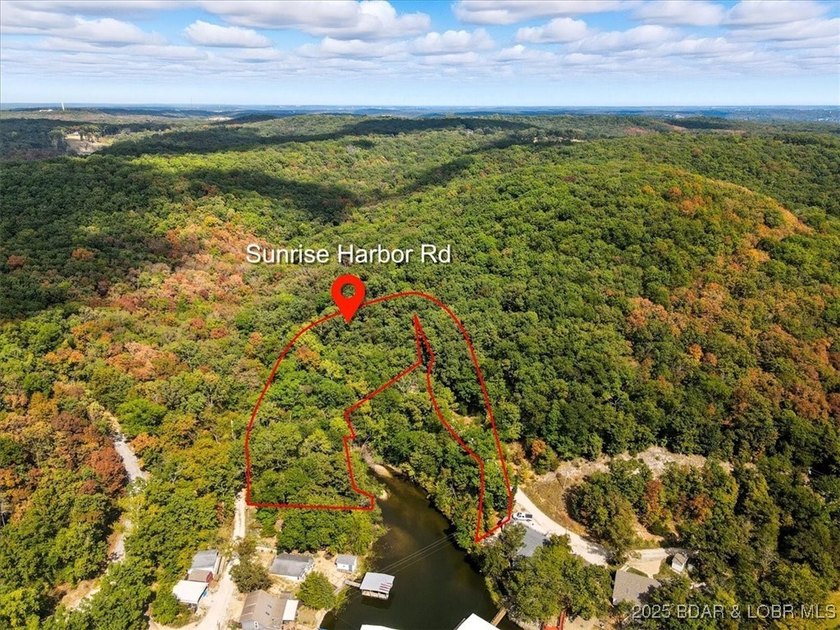 Lakefront opportunity on the 34 MM! This wooded cove location - photo 13