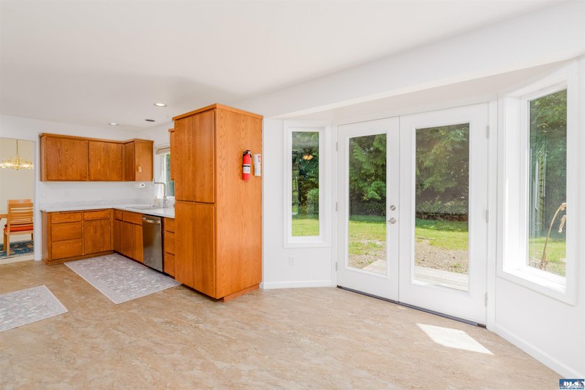 Welcome to this spacious 4-bedroom, 2.5-bath home on 5 peaceful - photo 14