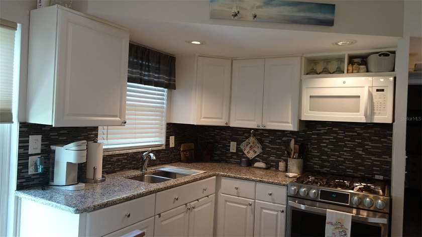 Welcome to your quiet Florida oasis in Tyrone Villas! Discover - photo 22