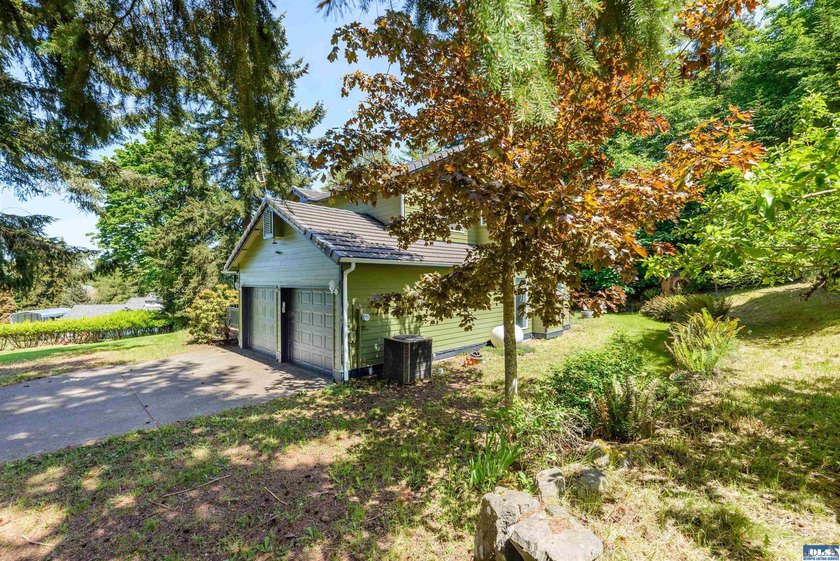 Welcome to this spacious 4-bedroom, 2.5-bath home on 5 peaceful - photo 47