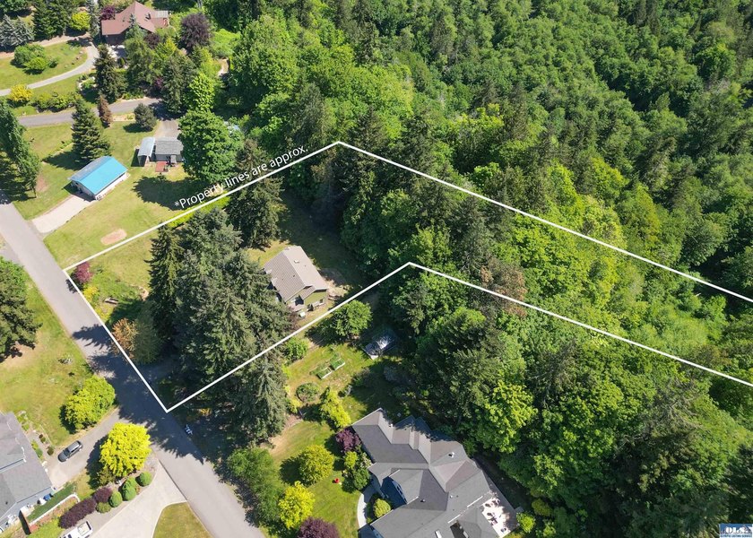 Welcome to this spacious 4-bedroom, 2.5-bath home on 5 peaceful - photo 50