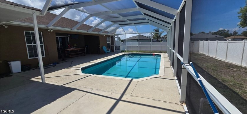 Beautiful three -bedroom, two-bathroom home featuring a covered - photo 22