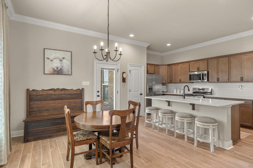 Welcome to 160 Hydrangea Boulevard in the desirable Bluffs at - photo 8