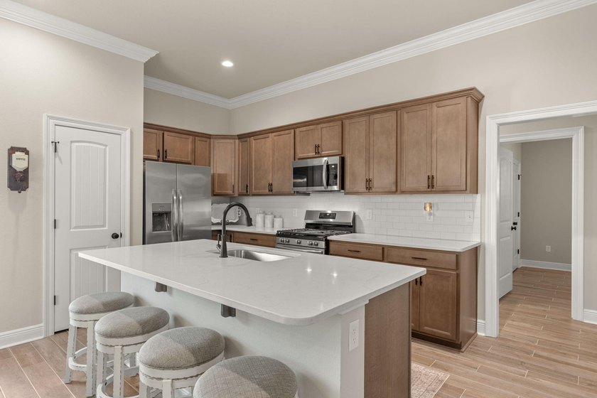 Welcome to 160 Hydrangea Boulevard in the desirable Bluffs at - photo 10