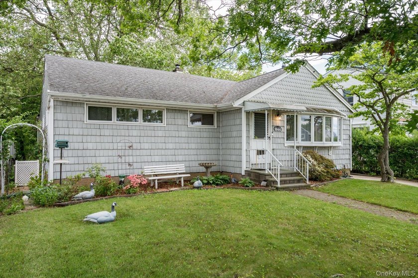 This is a ONE OF A KIND Home - Set on one of Merrick's deepest - photo 3