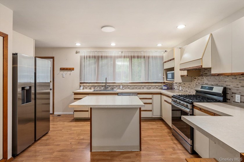 This is a ONE OF A KIND Home - Set on one of Merrick's deepest - photo 9