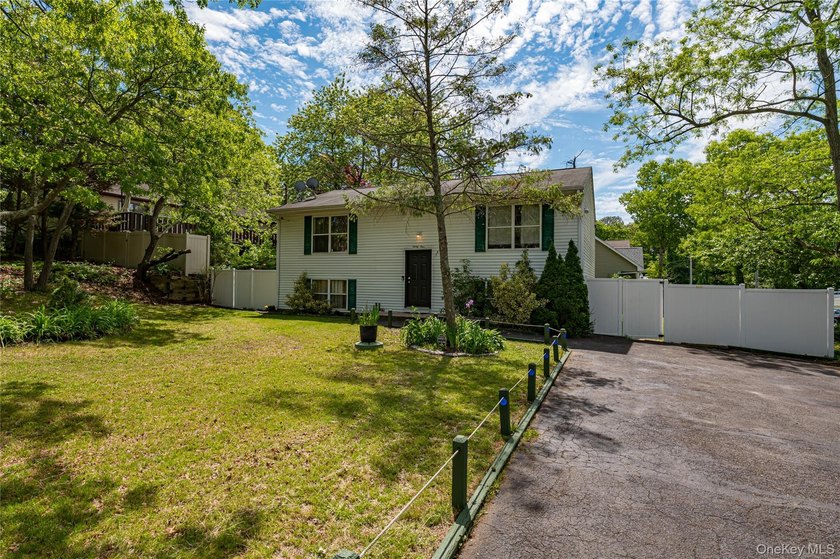 This Hi-Ranch style home offers 2 bedrooms and 1 full bathroom - photo 2