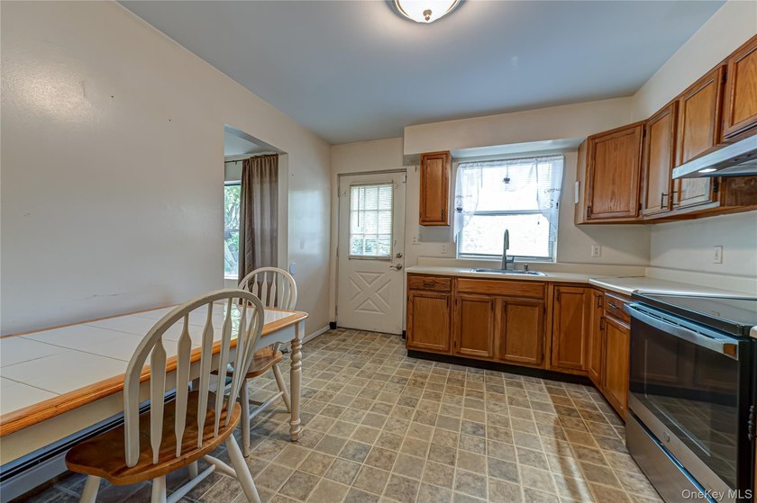 This Hi-Ranch style home offers 2 bedrooms and 1 full bathroom - photo 4