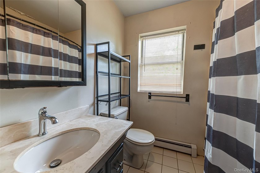 This Hi-Ranch style home offers 2 bedrooms and 1 full bathroom - photo 10