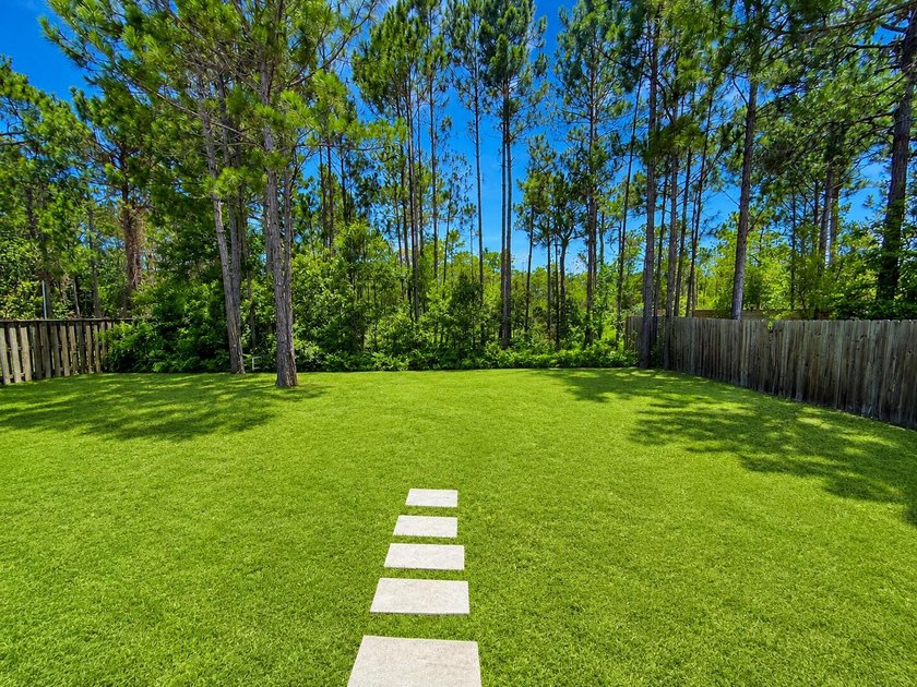 Live the coastal lifestyle in this remarkable 3 bedroom 3.5 - photo 3