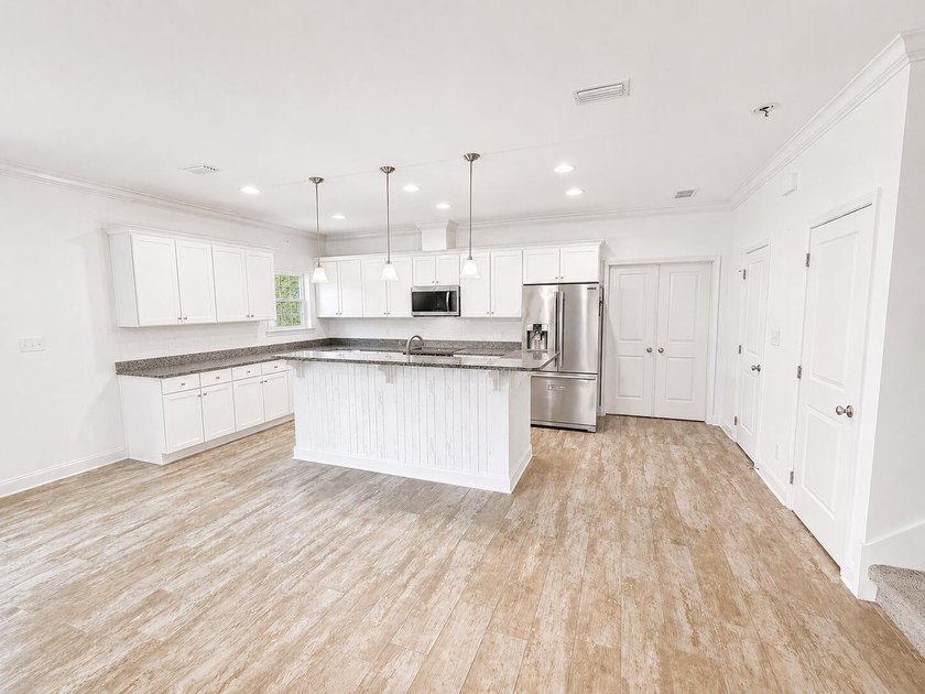 Live the coastal lifestyle in this remarkable 3 bedroom 3.5 - photo 5
