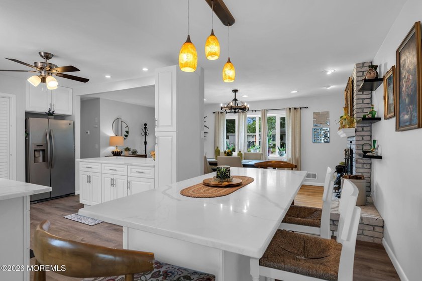Brick's highly desirable Lake Riviera offers this expanded 3 - photo 12