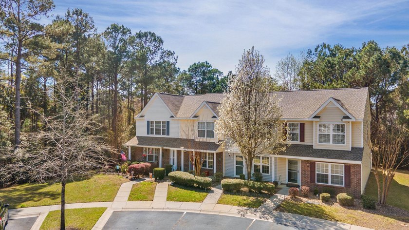 Nestled in a quiet, tucked-away neighborhood within the highly - photo 2