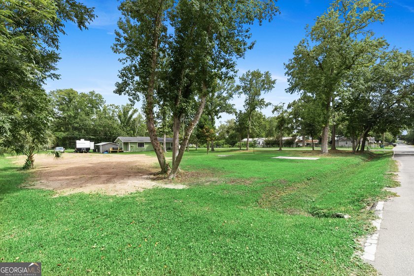 38 acre corner lot, cleared, in the city limits but feels like - photo 2