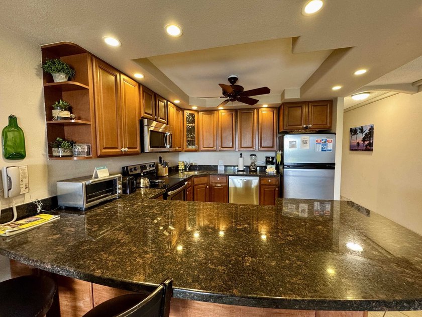 Welcome to your Maui getaway at Kamaole Sands, Building 10! This - photo 6