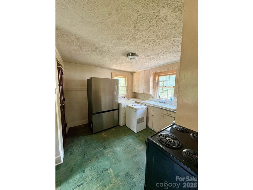 Just hit the market and has SO much potential! Come live, work - photo 11