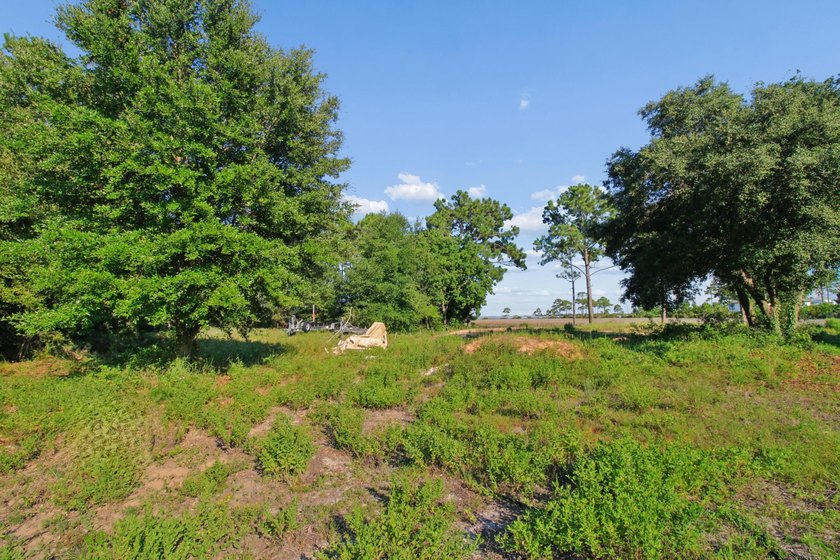 Build Your Dream Home with Stunning Water Views! This .37-acre - photo 2