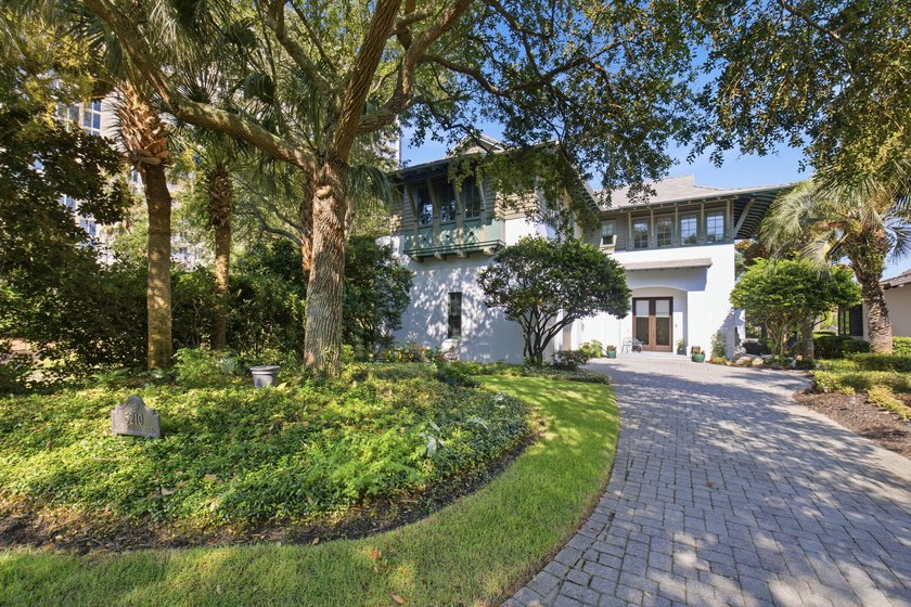 Experience refined coastal living within the prestigious, gated - photo 2