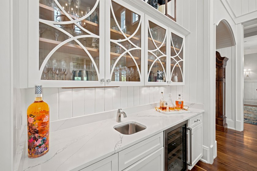 Experience refined coastal living within the prestigious, gated - photo 6