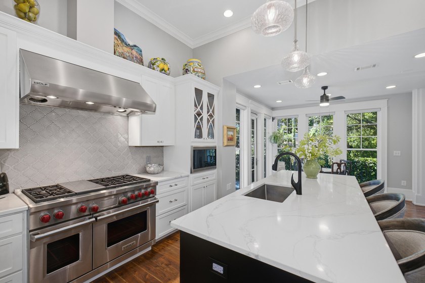 Experience refined coastal living within the prestigious, gated - photo 9