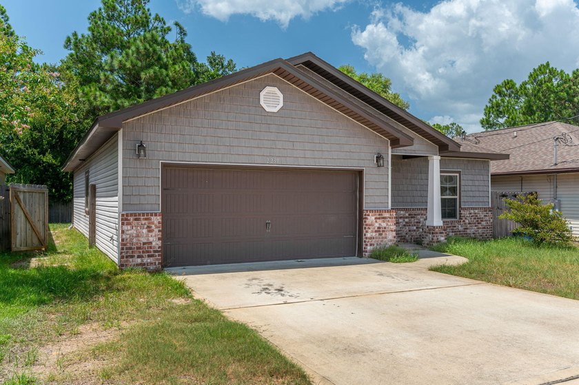 As you step inside, you are greeted with an open floor plan that - photo 3