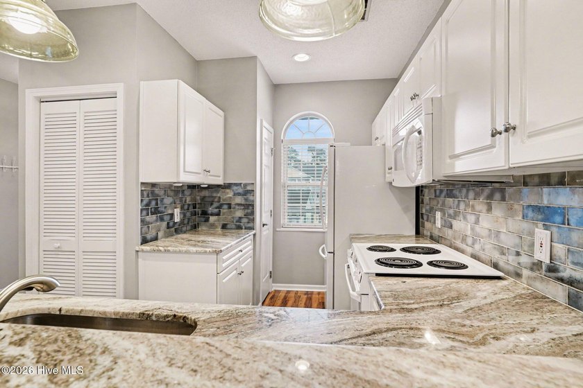 This beautifully updated condo combines comfort, style, and an - photo 11
