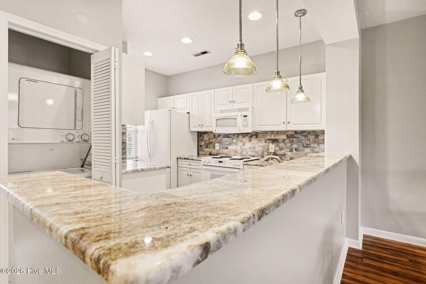 This beautifully updated condo combines comfort, style, and an - photo 12