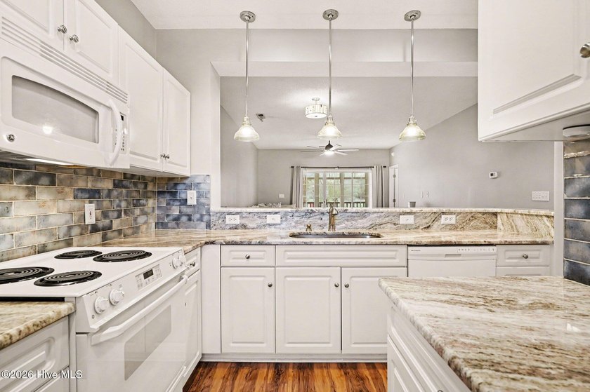 This beautifully updated condo combines comfort, style, and an - photo 13