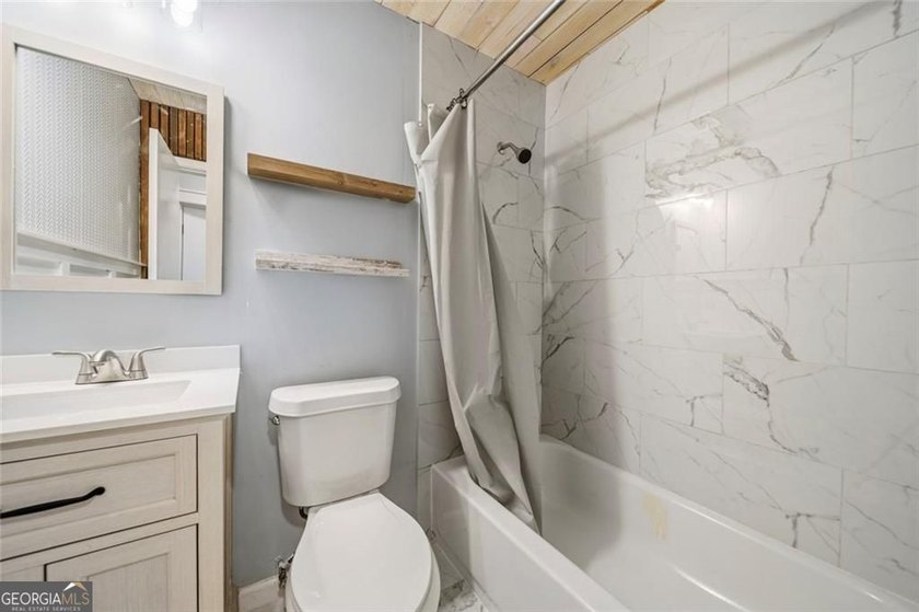 A beautifully maintained home with serene views of Canary Lake - photo 14